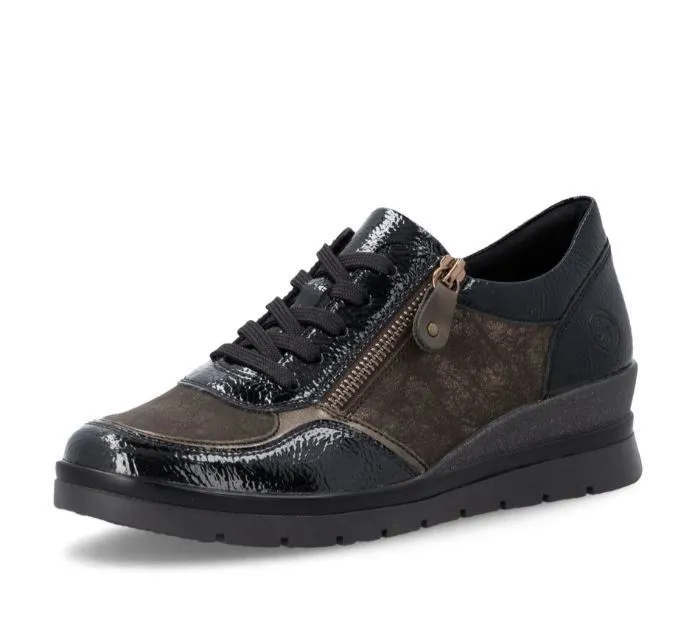 Baskets noires compensées pour femme Remonte. Référence : R0701-07 Noir. Disponible chez Chauss'Family magasin de chaussures à Issoire.
